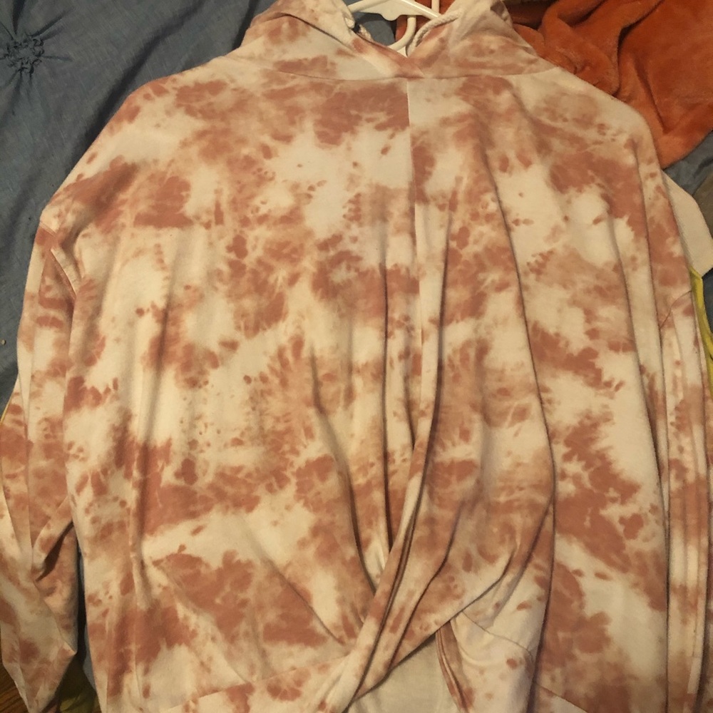 A shirt with a hoodie